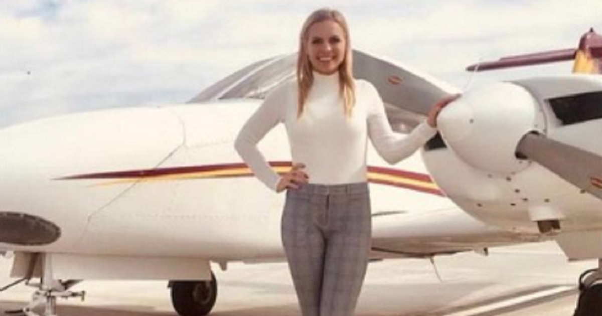 Chelsea Brittney Infanger, 30, is pictured standing next to a small plane.