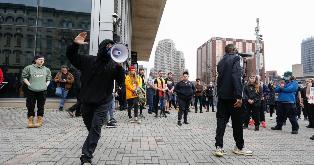 People protest the police shooting of Patrick Lyoya on Wednesday in Grand Rapids, Michigan.