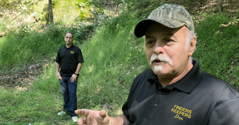 Dennis Parada, right, and his son Kem Parada stand at the site of the FBI's dig for Civil War-era gold in September 2018 in Dents Run, Pennsylvania.