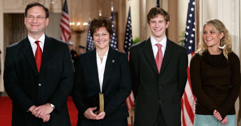 Supreme Court Justice Samuel Alito, left, and his wife Martha-Ann Bomgardner, second from left, son Philip, second from right, and daughter Laura, right, attend a ceremonial swearing-in for the newly confirmed justice at the East Room of the White House February 1, 2006.