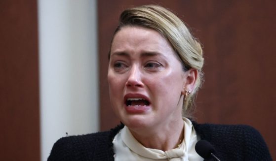 Actress Amber Heard testifies in Fairfax, Va., on May 5. Actor Johnny Depp is suing Heard, his ex-wife, for libel after she wrote an op-ed piece in The Washington Post in 2018 referring to herself as a public figure representing domestic abuse.