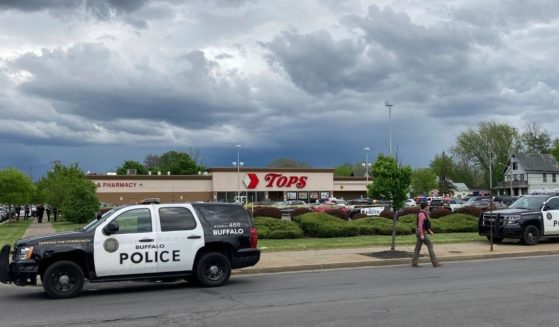 Buffalo police secure the scene after a shooting at a Tops Friendly Market in Buffalo, New York, on Saturday.