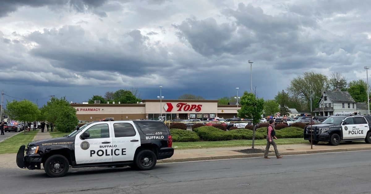 Buffalo police secure the scene after a shooting at a Tops Friendly Market in Buffalo, New York, on Saturday.