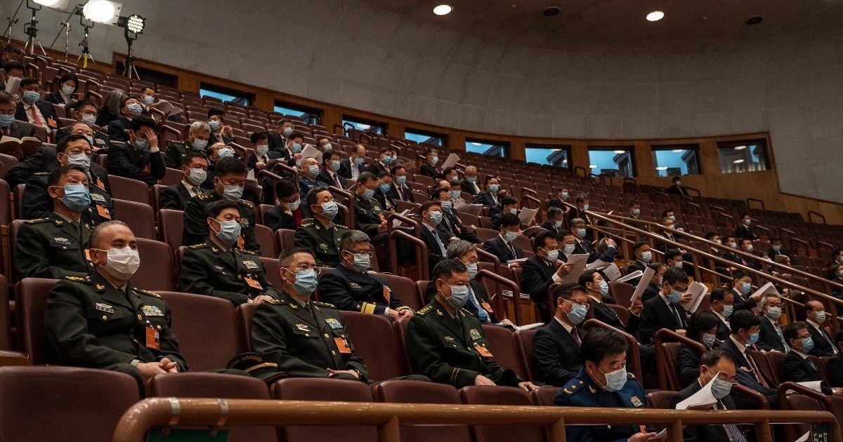 Members of the Chinese military sit in on the opening session of the National Peoples Congress at the Great Hall of the People on March 5 in Beijing, China.