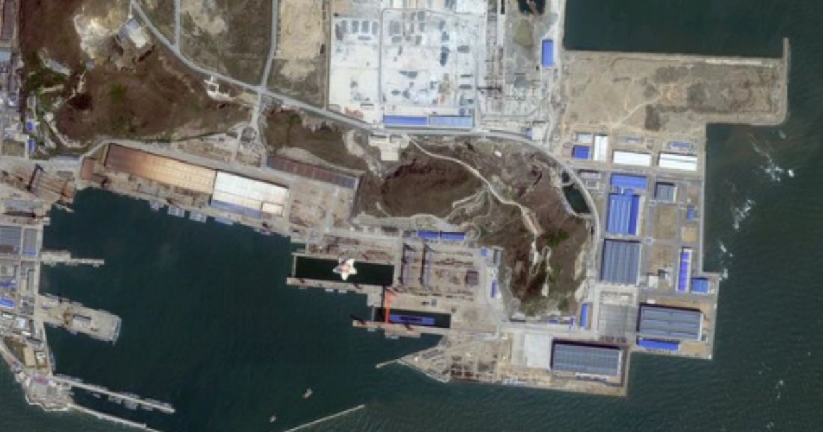Google satellite images from late April through early May indicate there may be a new class of Chinese nuclear submarines in Huludao Port, China.