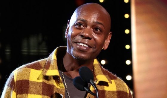 Dave Chappelle speaks onstage during the Rock & Roll Hall of Fame Induction Ceremony at Rocket Mortgage Fieldhouse in Cleveland on Oct. 30.