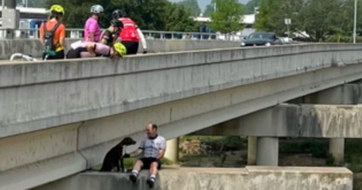 On May 22, 10 cyclists in Fort Worth, Texas, found a dog located in a precarious spot while out on a ride and took it upon themselves to rescue the poor animal.