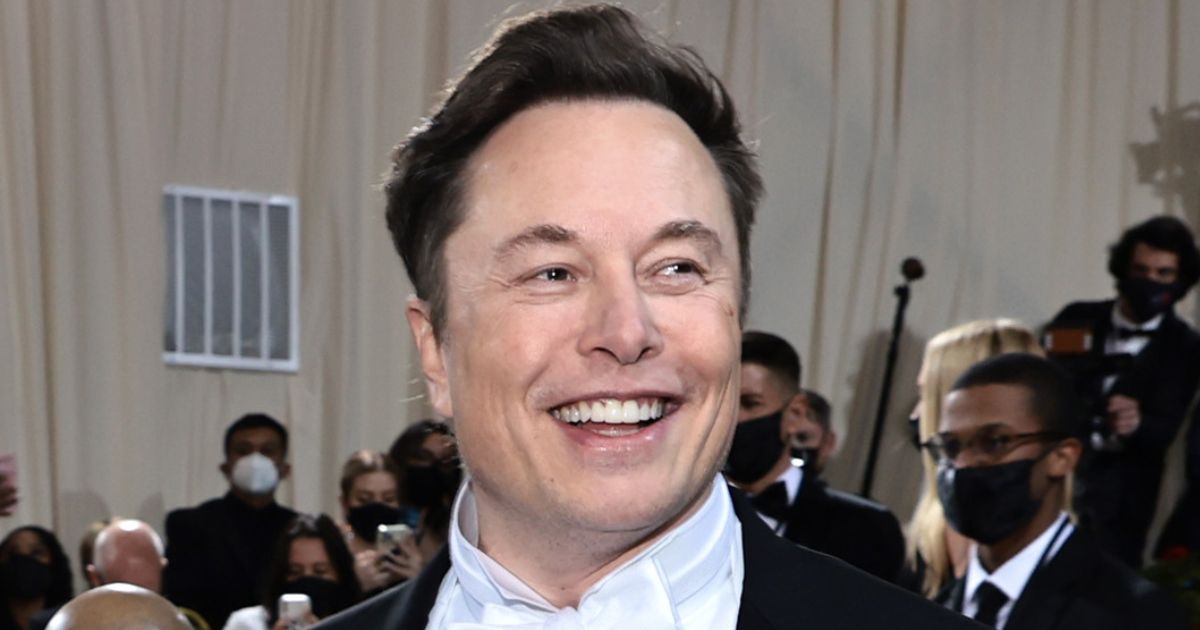Tesla CEO and self-made billionaire Elon Musk smiles at The 2022 Met Gala Celebrating "In America: An Anthology of Fashion" at The Metropolitan Museum of Art in New York on Monday.