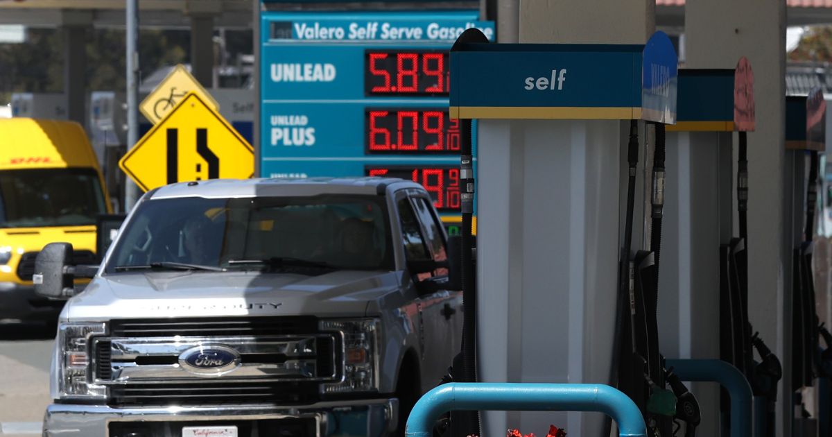 Customers get gas at a Valero gas station in Mill Valley, California, on April 26.
