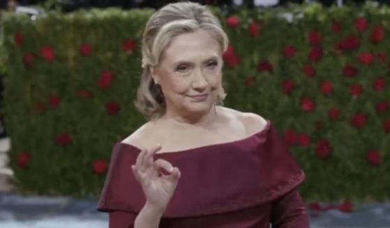 During her appearance on the red carpet at the Met Gala on Monday, Hillary Clinton flashed a hand sign that has been described as a symbol of white supremacy.