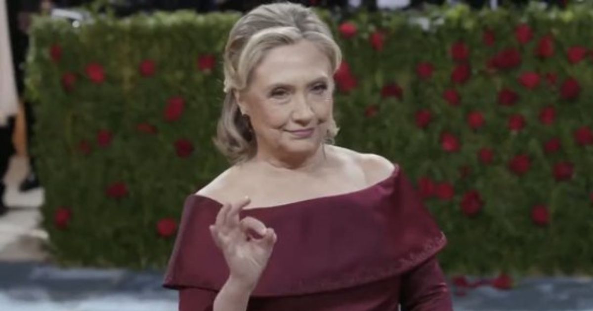 During her appearance on the red carpet at the Met Gala on Monday, Hillary Clinton flashed a hand sign that has been described as a symbol of white supremacy.