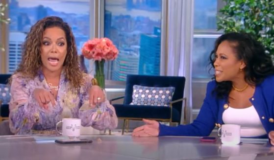 Sunny Hostin, co-host of "The View," talks while guest host Lindsey Granger looks on.