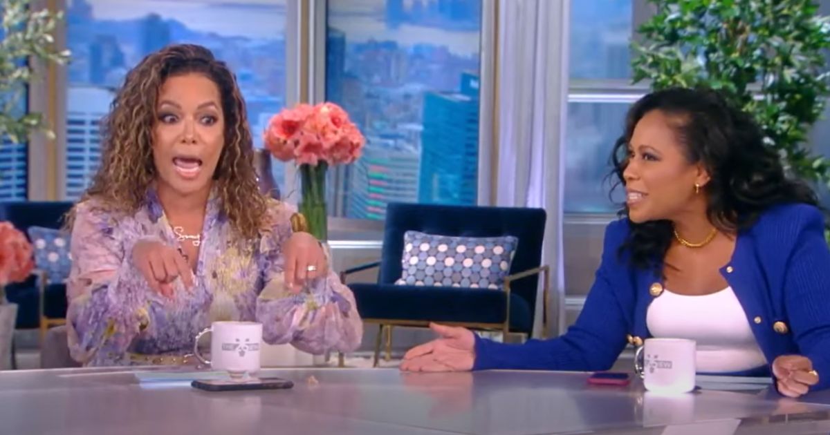 Sunny Hostin, co-host of "The View," talks while guest host Lindsey Granger looks on.