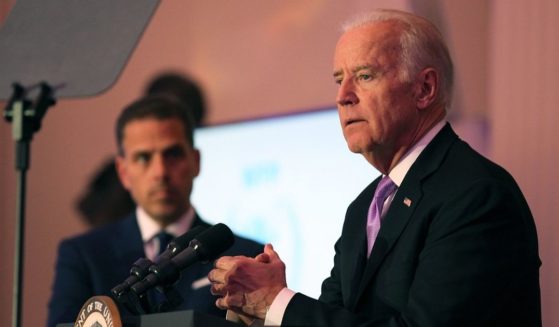 Hunter Biden looks on while his father, then-Vice President Joe Biden, speaks at a World Food Program USA event at the Organization of American States in Washington on April 12, 2016.