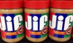 Jars of creamy Jif peanut butter are pictured on a grocery store shelf. A recall has been issued on contaminated containers of the brand's creamy and crunchy peanut butter.