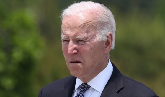 President Joe Biden arrives for a visit to Seoul National Cemetery in South Korea on Saturday.