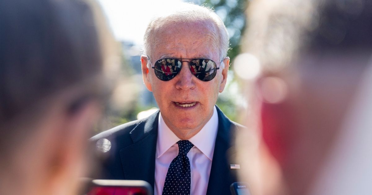 President Joe Biden speaks to reporters on the South Lawn of the White House in Washington on Monday.