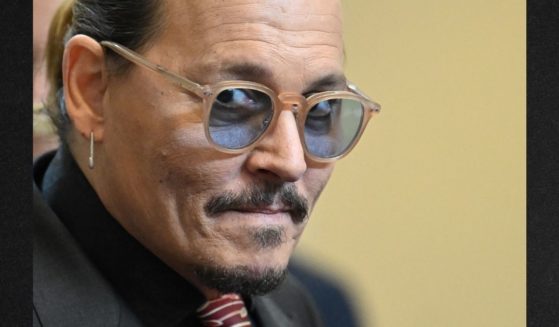 Actor Johnny Depp looks on in the courtroom in Fairfax, Virginia, on May 3. Depp sued his ex-wife Amber Heard for defamation after she wrote an op-ed piece in The Washington Post in 2018 referring to herself as a 'public figure representing domestic abuse.'