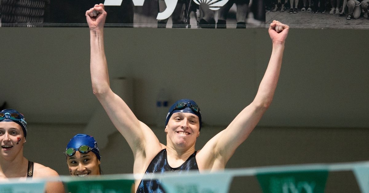 Lia Thomas, a man who identifies as a woman, celebrates the University of Pennsylvania women's swim team winning the 400-yard freestyle relay at the 2022 Ivy League Women's Swimming and Diving Championships in Cambridge, Massachusetts on Feb. 19.