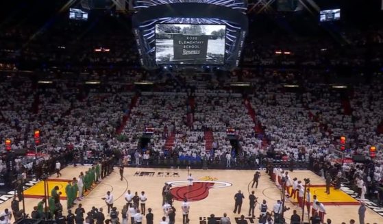 Before Wednesday's playoff game against the Boston Celtics, the Miami Heat held a moment of silence for the shooting at Robb Elementary School in Uvalde, Texas, in which they advocated for those in attendance and those watching to demand "common sense gun laws."