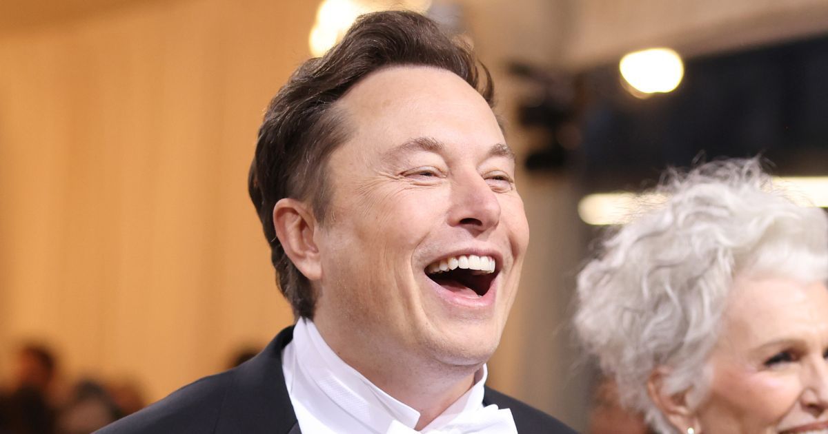 Billionaire Elon Musk smiles while walking around the Met Gala at the Metropolitan Museum of Art in New York on Monday.