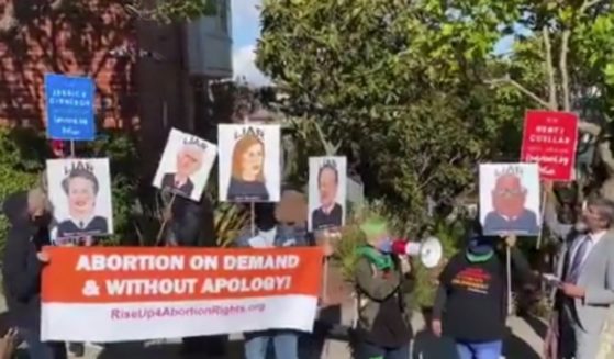 Pro-abortion activists protest outside the San Francisco home of House Speaker Nancy Pelosi on Wednesday.