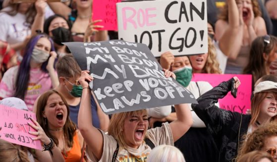 Pro-abortion protesters rally at the Utah State Capitol in Salt Lake City on Thursday.