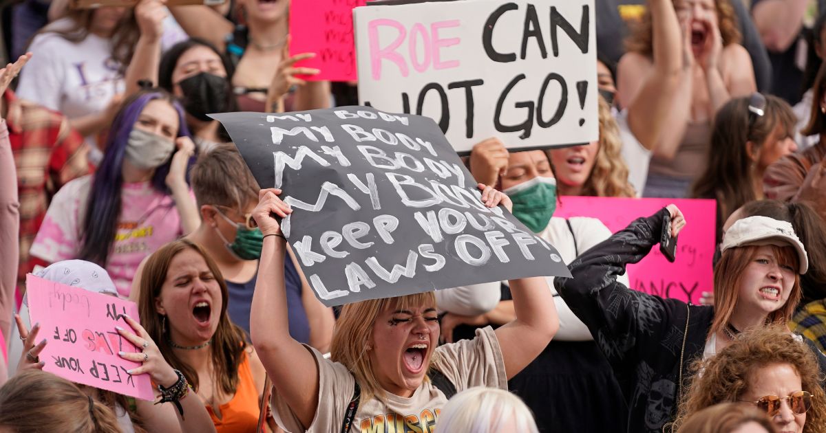 Pro-abortion protesters rally at the Utah State Capitol in Salt Lake City on Thursday.
