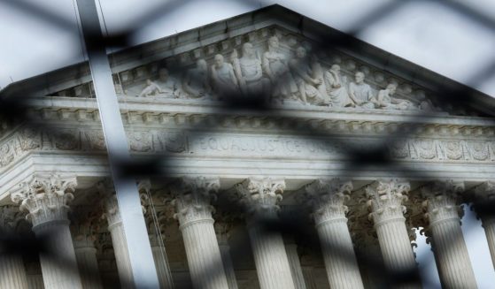 Protective fencing surrounds the U.S. Supreme Court on Tuesday in Washington, D.C.