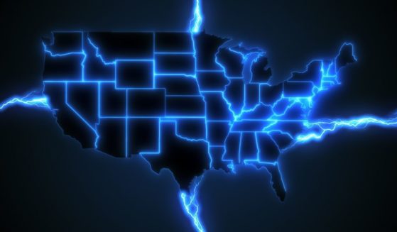 A map of the United States features blue electrical charges to illustrate the power grid.