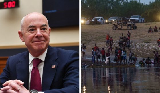 Department of Homeland Security Secretary Alejandro Mayorkas, left; illegal immigrants at the southern border in September, right.
