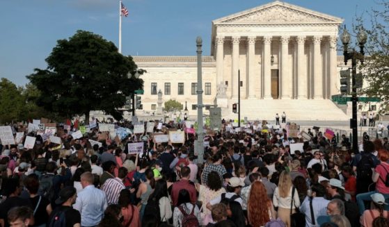Pro-abortion demonstrators mob the outside of the Supreme Court building in Washington on Tuesday, the day after a leak of a draft opinion that would overturn Roe v. Wade, the 1973 decision that made abortion legal throughout the United States.