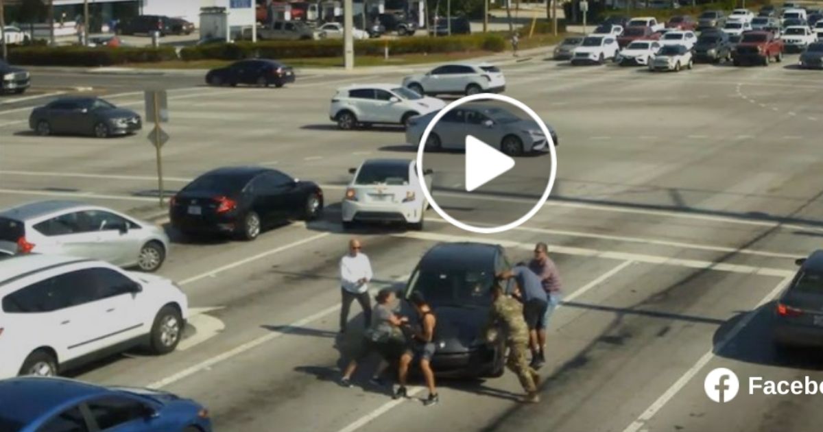 Good Samaritans in Boynton Beach, Florida, help save a driver from oncoming traffic after the driver suffered a medical episode on May 5, 2022.