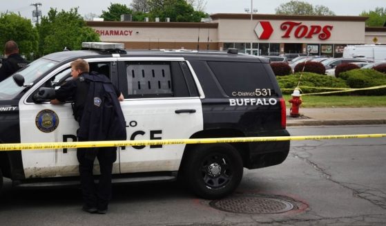 Police and FBI agents on Monday continue their investigation of Saturday's shooting at the Tops Friendly Market in Buffalo, New York, that left 10 dead.