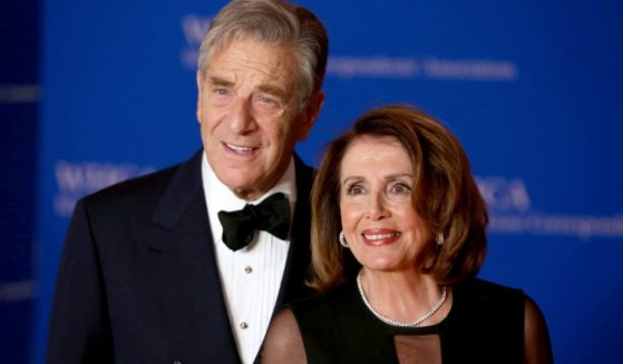 House Speaker Nancy Pelosi and her husband, Paul, are pictured in a file photo from the White House Correspondents' Dinner in Washington in 2018.
