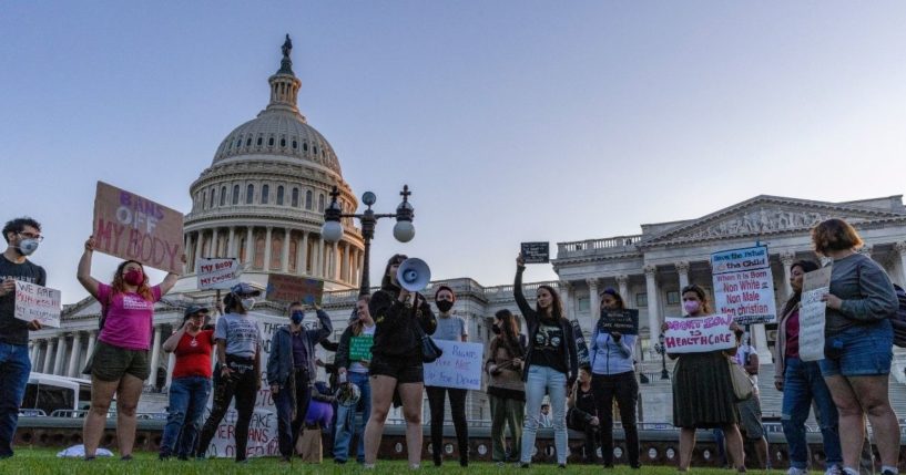 Abortion advocates protest in front of the U.S. Supreme Court on Tuesday in Washington, D.C.