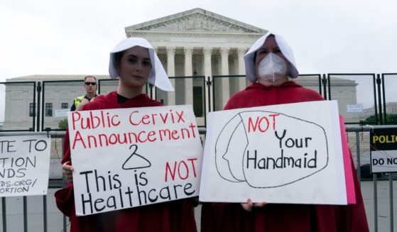 Abortion advocates protest at the U.S. Supreme Court on Saturday in Washington, D.C.