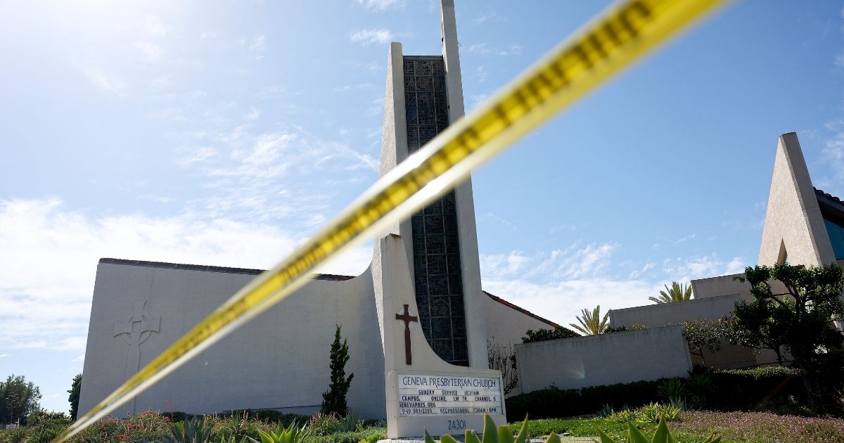 Police tape blocks off the scene of a shooting at Geneva Presbyterian Church on Sunday in Laguna Woods, California.