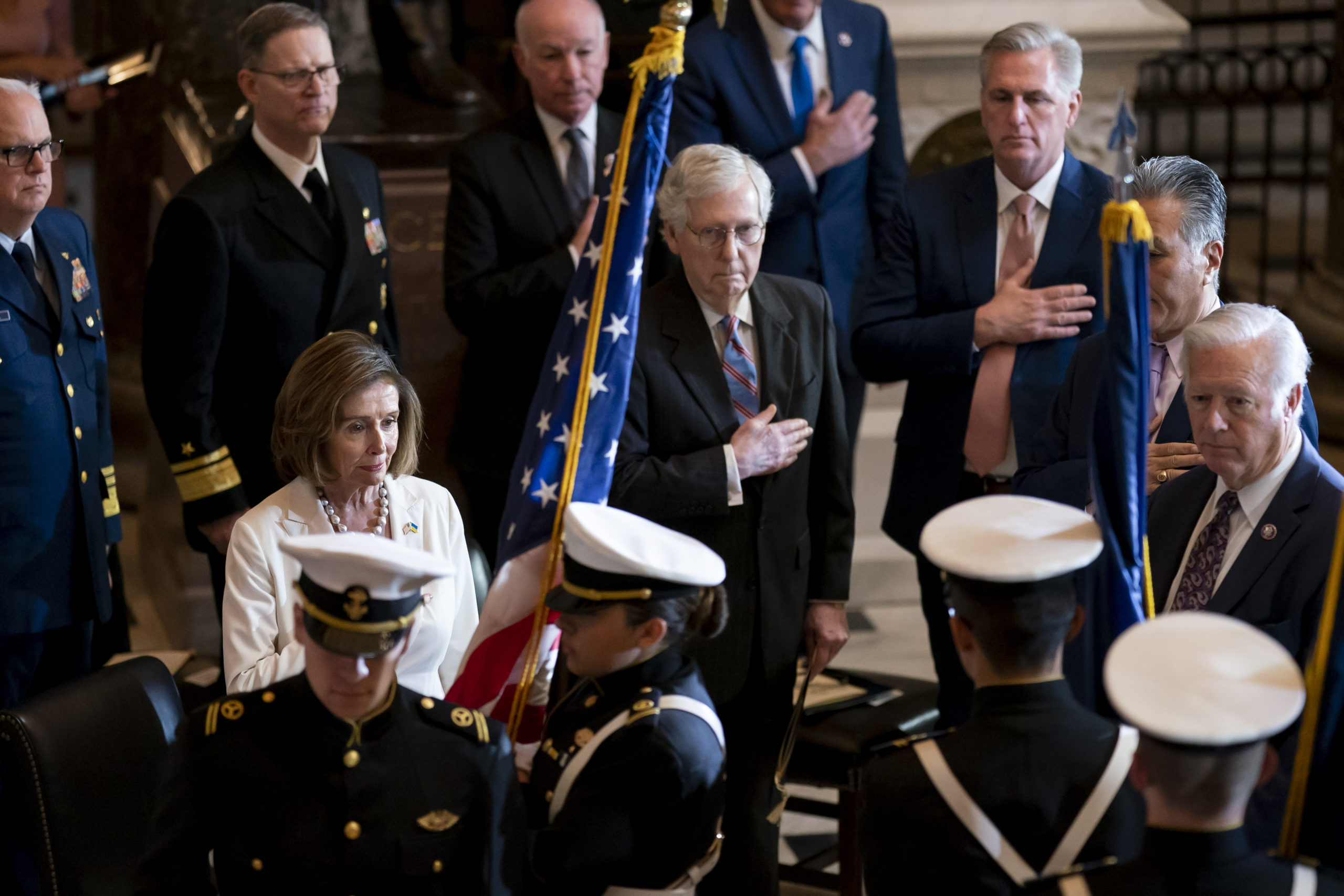 Democratic Speaker of the House Nancy Pelosi, Republican Senate Minority Leader Mitch McConnell and Republican House Minority Leader Kevin McCarthy attend a Congressional Gold Medal ceremony to honor members of the Merchant Marine who served in World War II, at the Capitol in Washington, D. C., on Wednesday.