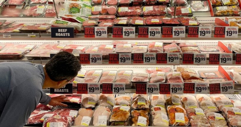 A man shops for meat at a Safeway grocery store in Annapolis, Maryland, on Monday.