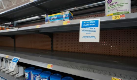 Shelves typically stocked with baby formula sit mostly empty at a store in San Antonio on Tuesday.