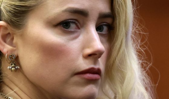 Actress Amber Heard waits to hear the verdict in the defamation lawsuit and countersuit between her ex-husband Johnny Depp and herself at the Fairfax County Circuit Courthouse in Fairfax, Virginia on June 1.