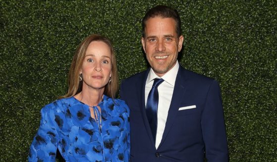Hunter Biden, right, and Kathleen Buhle, left, arrive at the Annual McGovern-Dole Leadership Award Ceremony on April 12, 2016, in D.C.