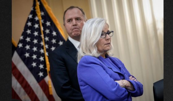 Anti-Trump Republicans Rep. Adam Schiff of California and Rep. Liz Cheney of Wyoming look on during a break in a hearing of the Select Committee to Investigate the January 6th Attack on the U.S. Capitol in the Washington Thursday.