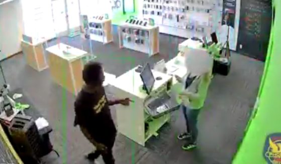 CCTV footage released by Phoenix Police shows the seconds before a man assaulted a female employee at a Cricket Store in Phoenix, Arizona on Saturday.