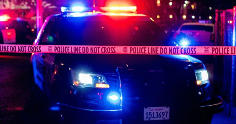 Police cars and tape block off a crime scene in Sacramento, California, on Feb. 28.