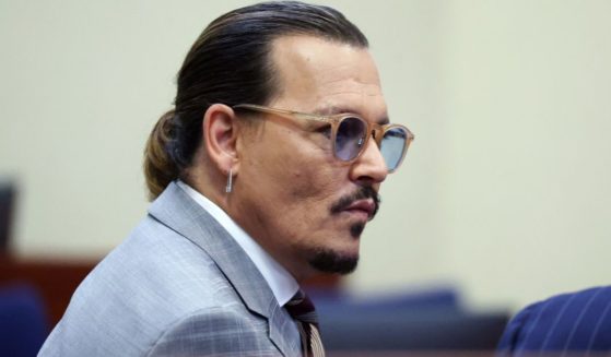 Johnny Depp arrives in court at the Fairfax County Circuit Courthouse in Fairfax, Virginia, on May 26.
