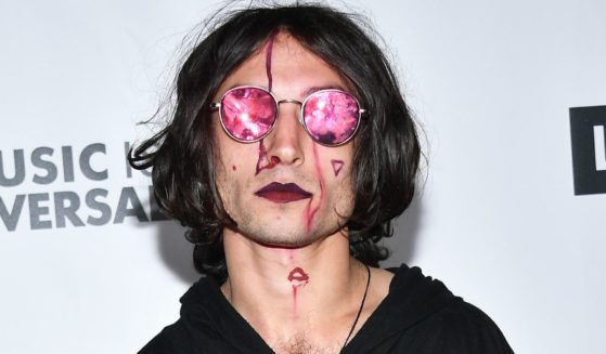 Ezra Miller is pictured at the Universal Music Group's 2020 Grammy after party at the Rolling Greens Nursery in Los Angeles, California, on Jan. 26, 2020.