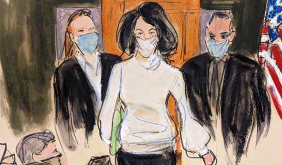 A court sketch from Nov. 29, 2021, shows Ghislaine Maxwell entering a courtroom at the beginning of her trial in New York.