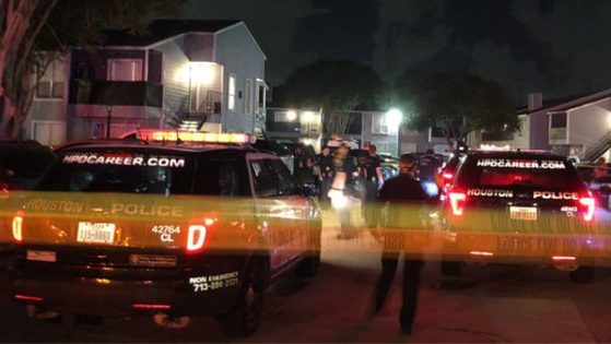 Harris County police officers responding to a shooting at an apartment building on May 30, in Harris County, Texas.